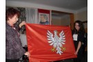 Przewodnicząca SU odbiera flagę województwa mazowieckeigo